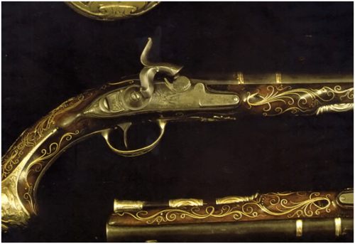 12. Par de pistolas de percussão inglêsas feitas pelo armeiro John Harman